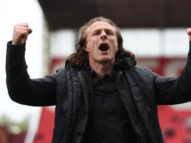 STOKE ON TRENT, ENGLAND - APRIL 29: Gareth Ainsworth manager of Queens Park Rangers celebrates following the Sky Bet Championship between Stoke City and Queens Park Rangers at Bet365 Stadium on April 29, 2023 in Stoke on Trent, England. (Photo by Nathan Stirk/Getty Images)