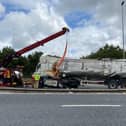 The milk tanker is righted on the M6 near Preston after the incident early this morning