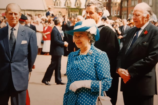 The Queen and the Duke of Edinburgh tour the grounds at Rossall School in 1994