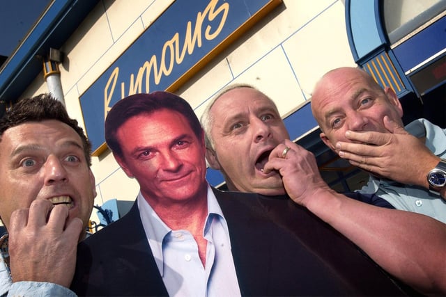 Preparing for Richard Hillman's (alias actor Brian Capron) appearance at Rumours with a cardboard cut out are  L-R Steve Martell, Colin Jon, Dave Corner
