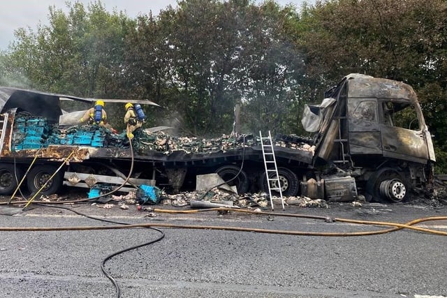 Drivers faced massive queues extending for 12 miles, and delays of up to four hours as traffic officers recovered the burned-out vehicle and repaired the damaged road, bridge and barriers.