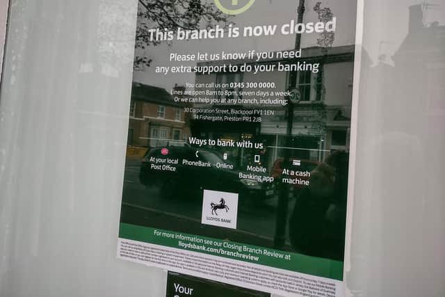 Advice for customers on the window of the now-closed bank.
