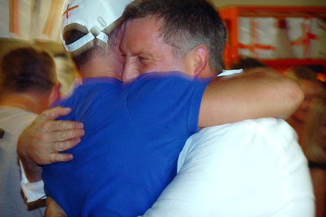 A consoling hug as England go out in 2006