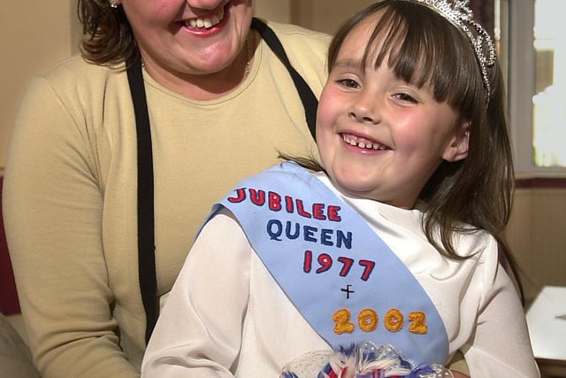 Miranda Casey with her daughter Malandra, 6, who was wearing the dress her mum wore at the silver Jubilee in 1977