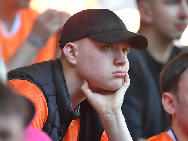This supporter's body language summed up up the mood inside Bloomfield Road