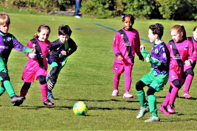 Action from the match between FC Rangers Vixen Storm and St Annes Purples