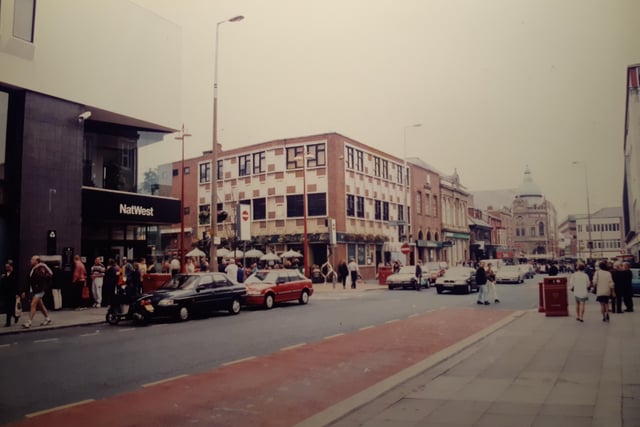 This scene looks down Corporation Street towards the Grand Theatre. The entrance to Birley Street is on the left. This was possibly mid-90s. Note the queue to the cash machine at the Nat West
