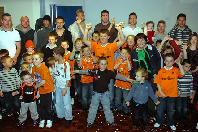 Blackpool FC  players join in the fun at a party for junior supporters held at the club