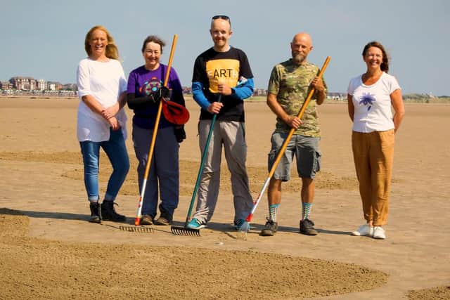 Artist Richard Shilling (centre) with (from left) Tracey Hope, lead co-ordinator for Fylde litter picking volunteers; ,land artists Julia Brooklyn and Justin Lindsey-Noble and Fylde Council leader Karen Buckley