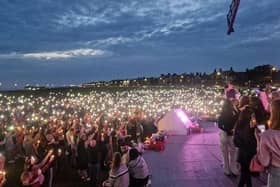 Thousands turned to a candlelit vigilheld on Lytham Green yesterday evening in memory of 14-year-old Bella Greer