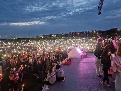 Thousands turned to a candlelit vigilheld on Lytham Green yesterday evening in memory of 14-year-old Bella Greer