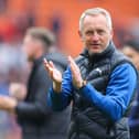 BLACKPOOL, ENGLAND - APRIL 30: Neil Critchley, manager of Blackpool, applauds the home support after the Sky Bet Championship match between Blackpool and Derby County at Bloomfield Road on April 30, 2022 in Blackpool, England. (Photo by James Gill/Getty Images)