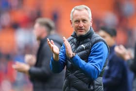 BLACKPOOL, ENGLAND - APRIL 30: Neil Critchley, manager of Blackpool, applauds the home support after the Sky Bet Championship match between Blackpool and Derby County at Bloomfield Road on April 30, 2022 in Blackpool, England. (Photo by James Gill/Getty Images)