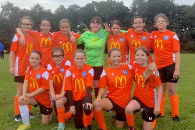 The Sharks sporting their new tangerine away kit. Photo: Johnathon Bailey