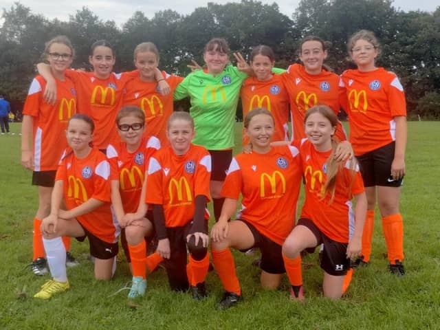The Sharks sporting their new tangerine away kit. Photo: Johnathon Bailey