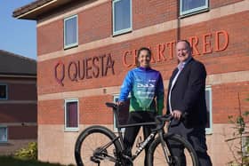 Blackpool cyclist Lizzie Hermolle and Questa managing director Anthony Hoskisson.