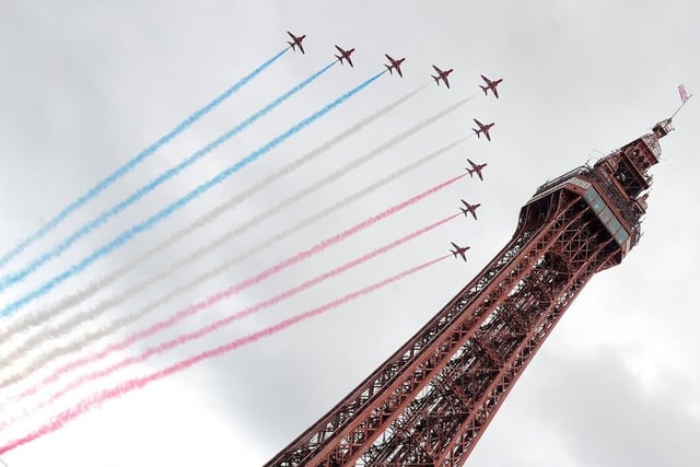 The Red Arrows fly past the famous Tower during Blackpool Air Show