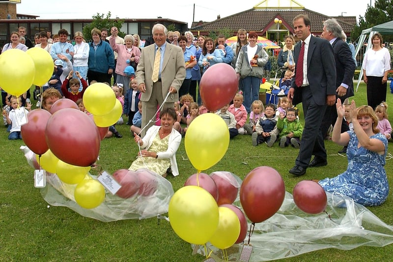 Tenth anniversary celebrations at Charles Saer Primary School Nursery Class, Fleetwood, 2003. Headteachers through the years, David Mitchell and Dave Mallinder release the balloons