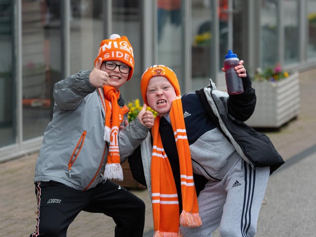 Blackpool fans arrive at Bloomfield Road ahead of the Championship fixture against Burnley. Photo: Kelvin Stuttard