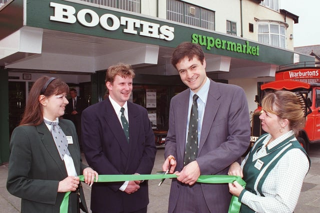 Mr Graham Booth (Director, E.H. Booth Co. Ltd) cuts a ribbon to officially re-open the South Shore branch of Booths, at Lytham Road, Blackpool. Also pictured from left, Karen Bardsley (supervisor), Darren Jacques (manager) and Jayne Cardwell (assistant)