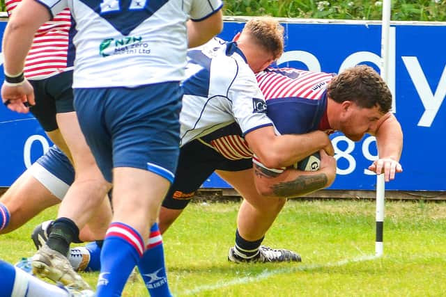 Corey Bowker drives over to score Lancashire's second try against Yorkshire Photo: Andy Sowden