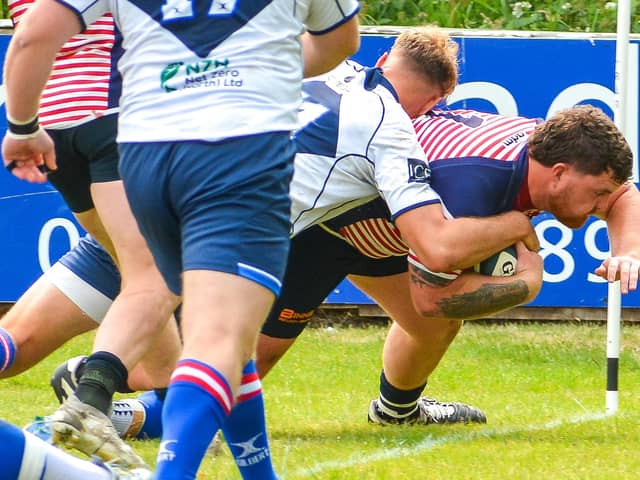 Corey Bowker drives over to score Lancashire's second try against Yorkshire Photo: Andy Sowden
