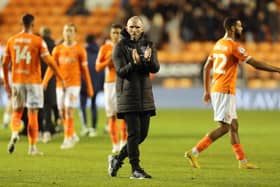 A disappointed Michael Appleton applauds the Blackpool fans at the full-time whistle