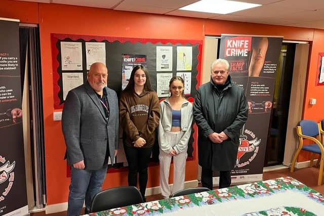 Coun Neal Brookes and John Blackledge with two of the competition winners Emily Flanagan and Jemima Perry.