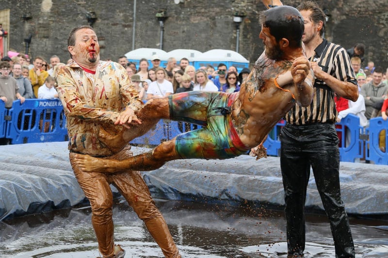 The international competition - named one of the top 10 weirdest 'sports' - sees 16 men and eight women battle in the sauce-soaked ring.