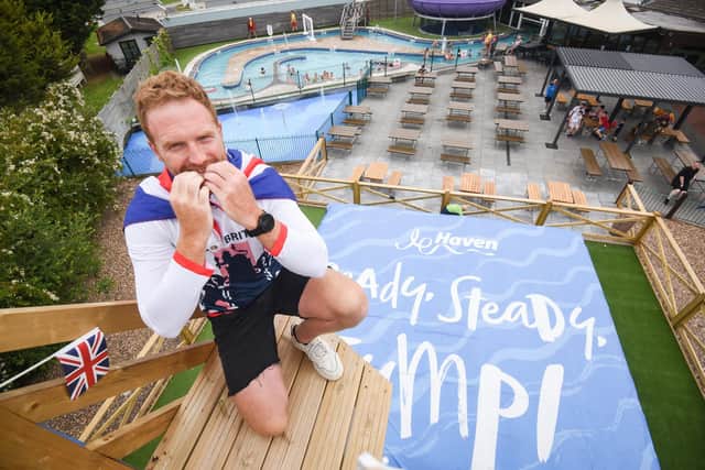 Olympian Will Satch helps launch the new outdoor activities at Martin Mere holiday park by taking the plunge from The Jump a freefall jump onto an inflatable