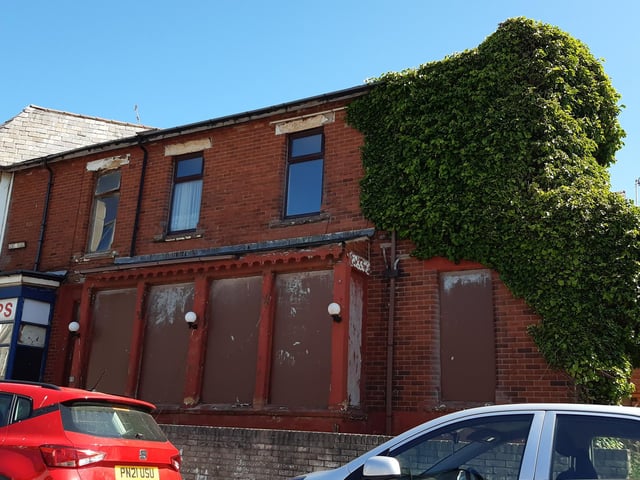 This was possibly a residential property. It's part of a building on the corner of Kent Road and Chapel Street and there is a chippy at the front. But this part is boarded up