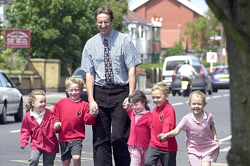 Year five teacher Andy Severyn with reception class children (from left), Jenna Hercus, Mark Drinnan, Briony Moxon, Connah Smith and Sharna Neal at Our Lady of the Assumption Catholic Primary School, Blackpool, 2002