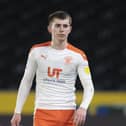 Woodburn made just 11 appearances during a brief loan spell at Bloomfield Road