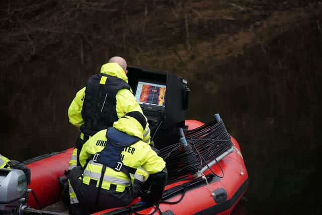 Workers from a private underwater search and recovery company, Specialist Group International, use sonar to search for Ms Bulley (Credit: Peter Byrne/PA Wire)