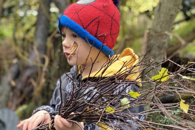 Children collected birch twigs to make the heads of their broomsticks, before learning how to fly over obstacles and celebrating their flying school graduation with a cup of hot chocolate by the campfire