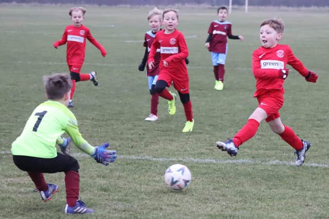 Blackpool Wren Rovers Blacks and Lytham Junior Windmills played a match that warmed the spirits on a bitterly cold January day Picture: Karen Tebbutt