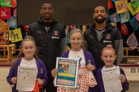 Blackpool players presented prizes to the winners of Blackpool FC Community Trust's Black History Month competition Picture: Blackpool FC Community Trust