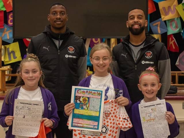 Blackpool players presented prizes to the winners of Blackpool FC Community Trust's Black History Month competition Picture: Blackpool FC Community Trust