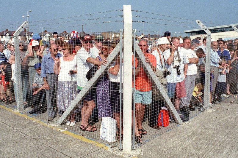 Blackpool Airport 90th anniversary celebrations in 1999. Spectators watch from behind the barriers and fences