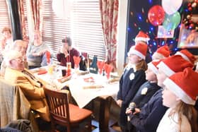 Pupils from Mayfield Primary choir sing for their community