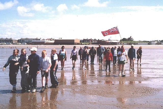 Wreck Trek walkers make their way across the sands to Wyre Light in 2002