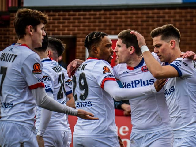 New boss James Rowe got off to a winning start with AFC Fylde thanks to Nick Haughton's (right) goal at Kidderminster Picture: Steve McLellan