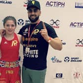 England Boxing Youth Open champion Alice Pumphrey from Blackpool  with head coach Mohamed Amin  Patel of the Purge Academy