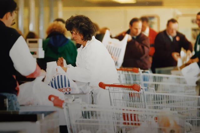 A busy scene at the checkouts - the old stripy carrier bags. This was September 1993