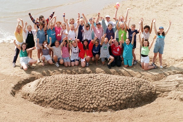 Greenlands High School pupils with  a sand scuplture on Blackpool Beach in 1997