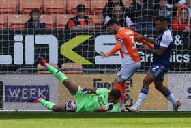 Blackpool are sweating on the fitness of club captain James Husband. He might not be fit in time to face Burton Albion. (Image: Camera Sport)