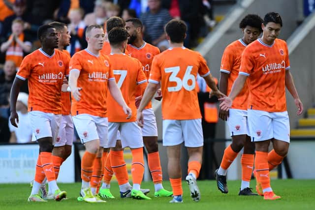 Blackpool celebrate their second goal in Tuesday's win at AFC Fylde Picture: Steve McLellan