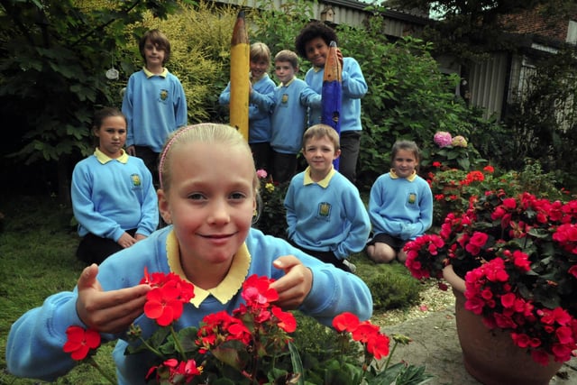 Pupils from Moor Park Primary School in the garden they entered into North West in Bloom competition.
Back L-R Zac Haslam, China Wright, Verity Kinnon, Joseph Cross, Jacob Dean, Chanelle Ralf, Callum Williams and Tegan Cookson at the front.