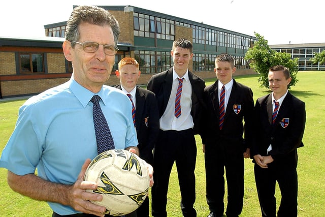 Frank Donnelly, who is retiring as chairman of Lancashire Schools FA. Pictured here at Cardinal Allen Catholic High School, Fleetwood, with current Blackpool Town Team players (from left) Michael Davies, Christian Dust, Jamie McKenna, and Steven Hastings