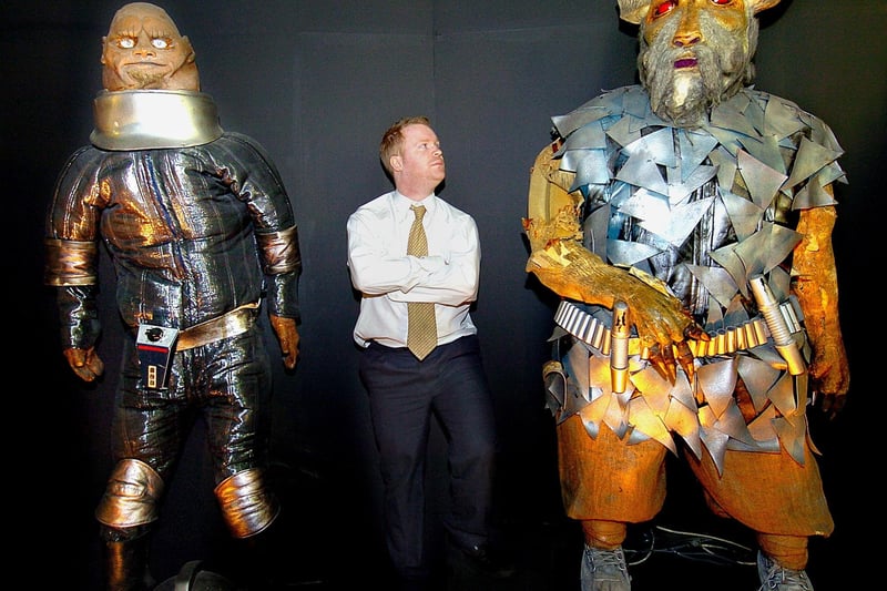 Former Gazette reporter Rob Stocks dwarfed by two of the monsters which had never been photographed before - Sontaran (left) and Garm